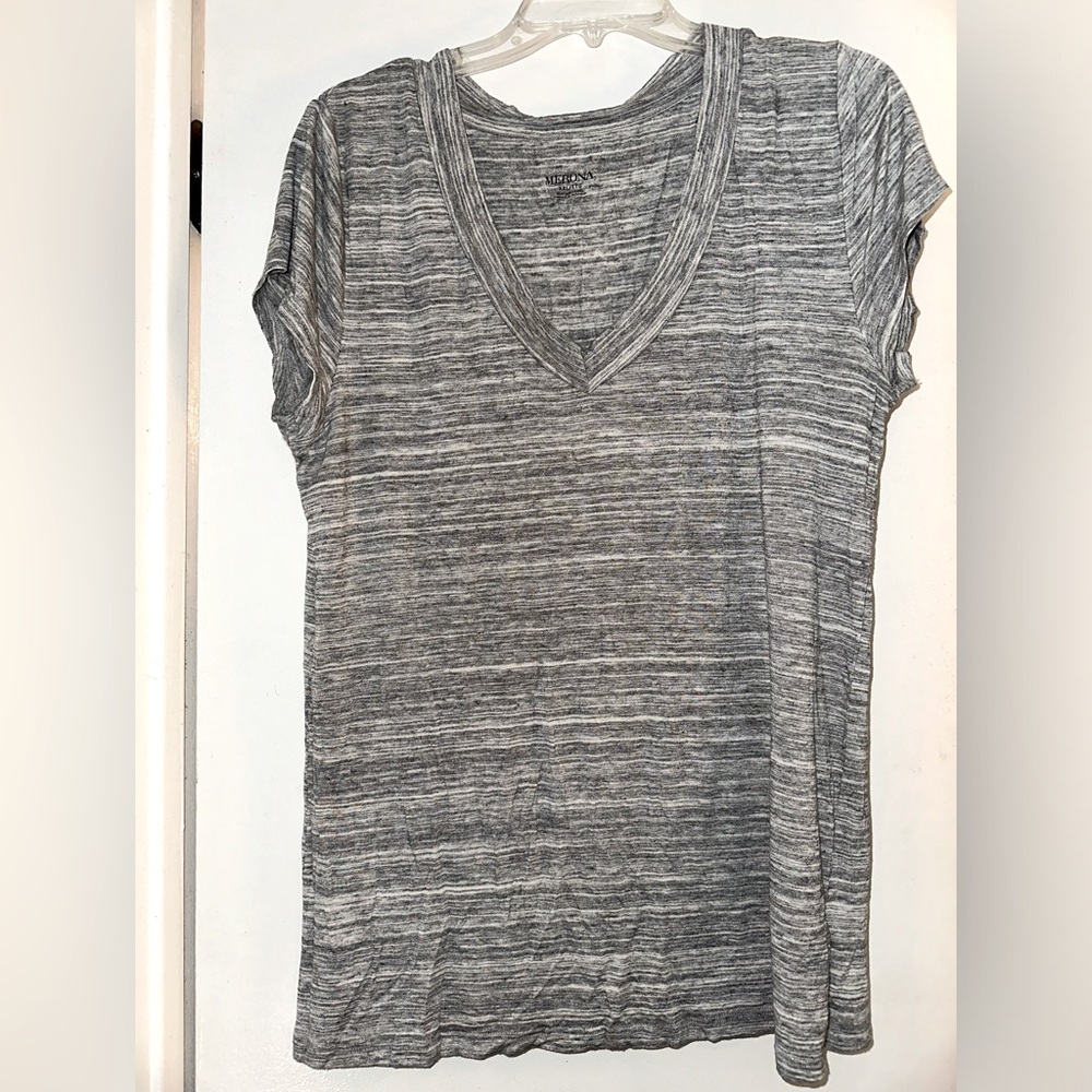 Gray v-neck stretchy t-shirt. Soft A-line form fitting shirt.